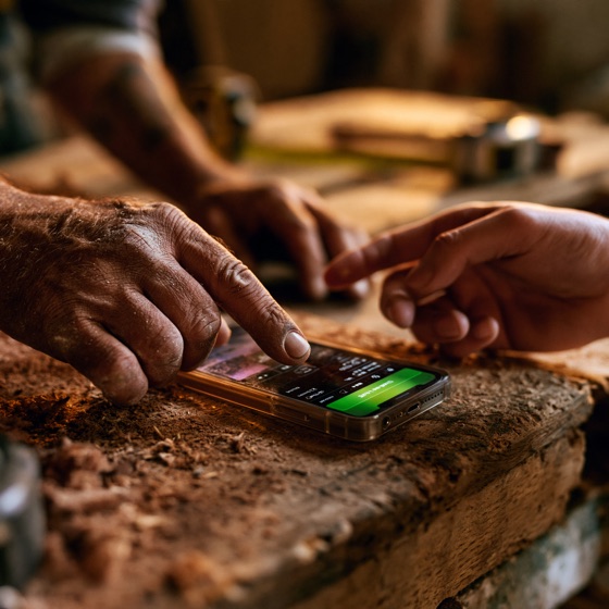Hands reviewing a deal on a phone